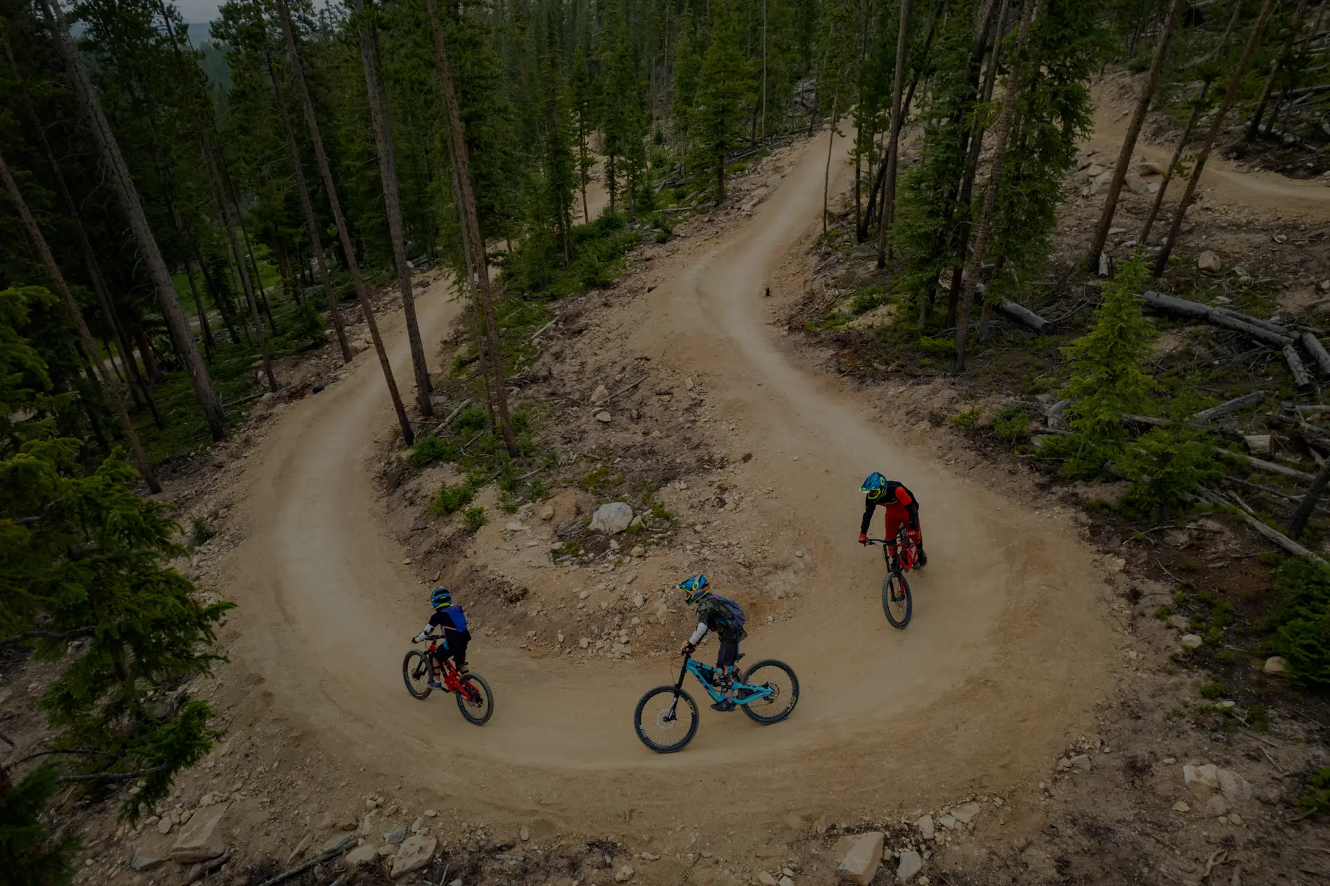 Bikers on a berm at Trestle Bike Park Colorado